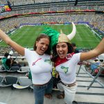 Fans pose for pictures ahead of the 2026 World Cup round of 16 football match between Brazil and Norway at the New York/New Jersey Stadium in East Rutherford on July 5, 2026.