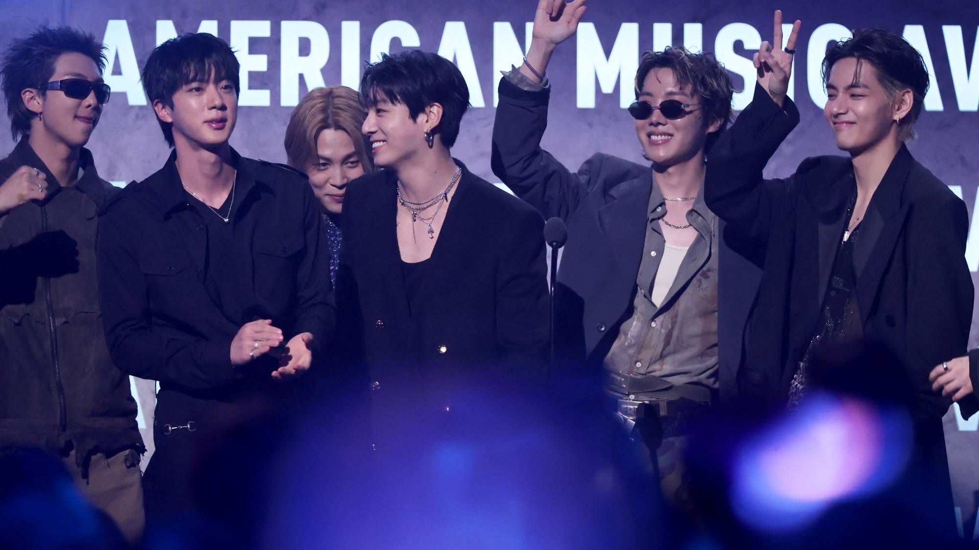 South Korean boy band BTS accepts the Artist of the Year Award on stage during the American Music Awards at the MGM Grand Garden Arena in Las Vegas, Nevada on May 25, 2026.