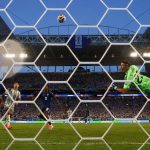 MIAMI GARDENS, FLORIDA - JULY 03: (EDITOR'S NOTE: Image was captured using a remote camera from behind the goal.) Emiliano Martinez #23 of Argentina concedes a second goal to Sidny Lopes Cabral #13 of Cabo Verde during the FIFA World Cup 2026 Round of 32 match between Argentina and Cabo Verde at Miami Stadium on July 03, 2026 in Miami Gardens, Florida. Robert Cianflone/Getty Images/AFP
