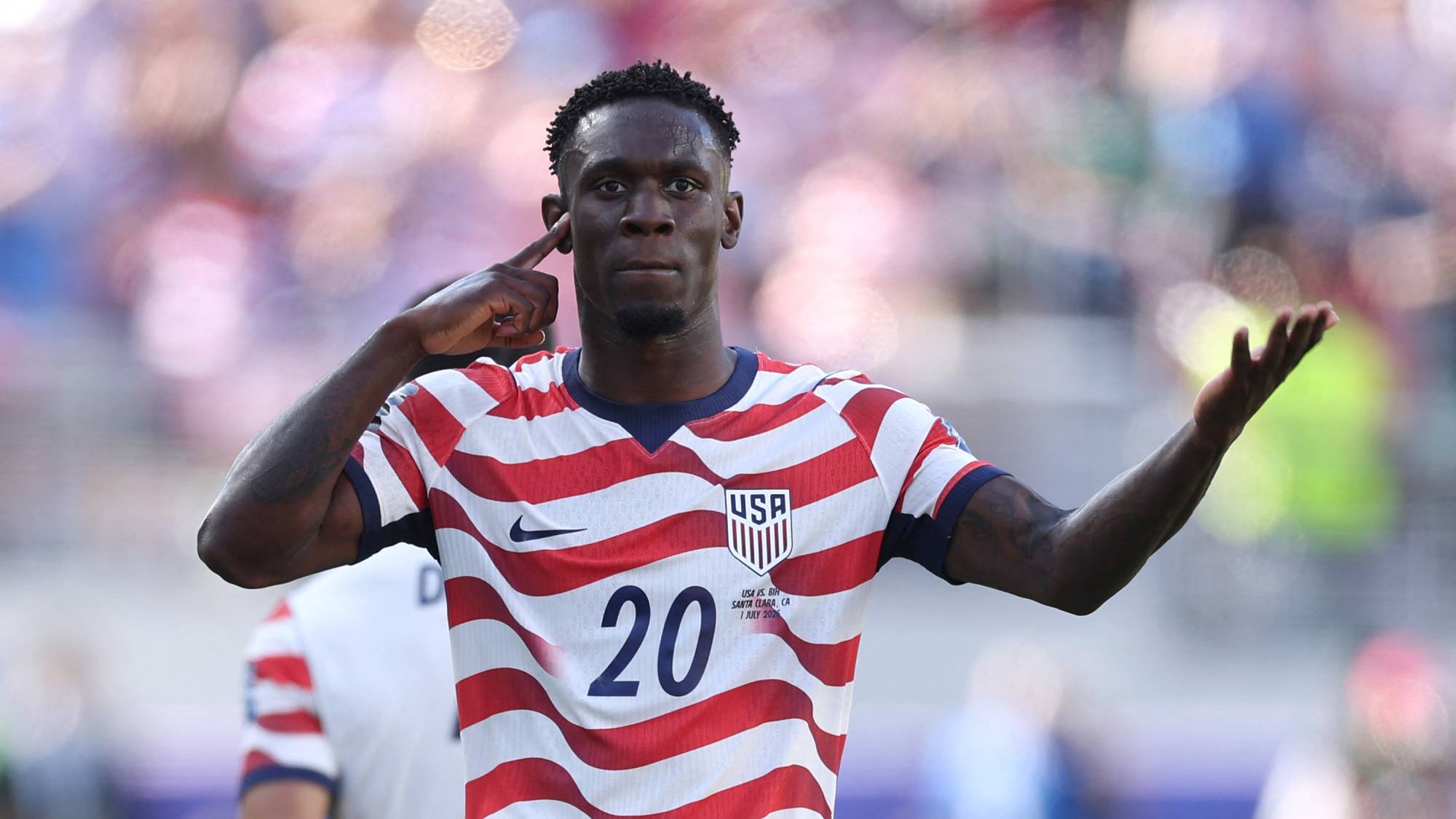 SANTA CLARA, CALIFORNIA - JULY 01: Folarin Balogun #20 of the United States celebrates scoring his team's first goal during the FIFA World Cup 2026 Round of 32 match between USA and Bosnia and Herzegovina at San Francisco Bay Area Stadium on July 01, 2026 in Santa Clara, California. Jamie Squire/Getty Images/AFP