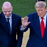 Gianni Infantino, president of FIFA, and Donald Trump, president of the United States, pose with the World Cup Trophy after the 2026 FIFA World Cup final match between Spain and Argentina at MetLife Stadium in East Rutherford, New Jersey, on July 19, 2026. (Photo by Waleed Ibrahim/NurPhoto)