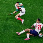 Mexico's defender #23 Jesus Gallardo and England's defender #26 Jarell Quansah fight for the ball during the 2026 World Cup round of 16 football match between Mexico and England at the Mexico City Stadium in Mexico City on July 5, 2026.