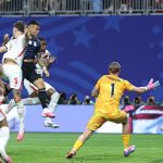 Argentina's forward #22 Lautaro Martinez heads the ball and scores his team's second goal during the 2026 World Cup football tournament semi-final match between England and Argentina at the Atlanta Stadium in Atlanta on July 15, 2026.