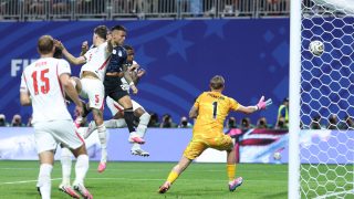 Argentina's forward #22 Lautaro Martinez heads the ball and scores his team's second goal during the 2026 World Cup football tournament semi-final match between England and Argentina at the Atlanta Stadium in Atlanta on July 15, 2026.