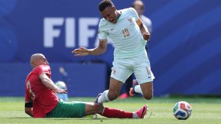 FOXBOROUGH, MASSACHUSETTS - JULY 09: Kylian Mbappe #10 of France is fouled in the penalty box by Noussair Mazraoui #3 of Morocco resulting in a penalty kick to France during the FIFA World Cup 2026 Quarter Final match between France and Morocco at Boston Stadium on July 09, 2026 in Foxborough, Massachusetts. Kevin C. Cox/Getty Images/AFP