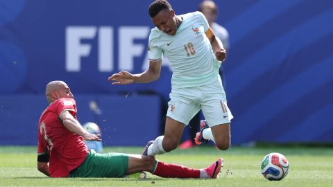 FOXBOROUGH, MASSACHUSETTS - JULY 09: Kylian Mbappe #10 of France is fouled in the penalty box by Noussair Mazraoui #3 of Morocco resulting in a penalty kick to France during the FIFA World Cup 2026 Quarter Final match between France and Morocco at Boston Stadium on July 09, 2026 in Foxborough, Massachusetts. Kevin C. Cox/Getty Images/AFP