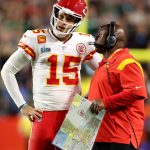 GLENDALE, ARIZONA - FEBRUARY 12: Patrick Mahomes #15 of the Kansas City Chiefs talks with offensive coordinator Eric Bieniemy during the fourth quarter against the Philadelphia Eagles in Super Bowl LVII at State Farm Stadium on February 12, 2023 in Glendale, Arizona. Christian Petersen/Getty Images/AFP