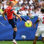 Norway's forward #09 Erling Braut Haaland kicks the ball past England's defender #03 Nico O'Reilly during the 2026 World Cup football tournament quarter-final match between Norway and England at Miami Stadium in Miami Gardens on July 11, 2026.