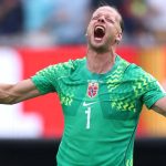 EAST RUTHERFORD, NEW JERSEY - JULY 05: Orjan Nyland #1 of Norway celebrates the 2nd Norway goal during the FIFA World Cup 2026 Round Of 16 match between Brazil and Norway at New York New Jersey Stadium on July 05, 2026 in East Rutherford, New Jersey. Justin Setterfield/Getty Images/AFP
