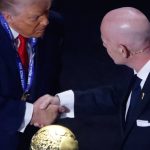 President Donald Trump receives the FIFA Peace Prize from FIFA President Gianni Infantino during the draw for the 2026 World Cup in the United States. (Photo by Deccio Serrano/NurPhoto)