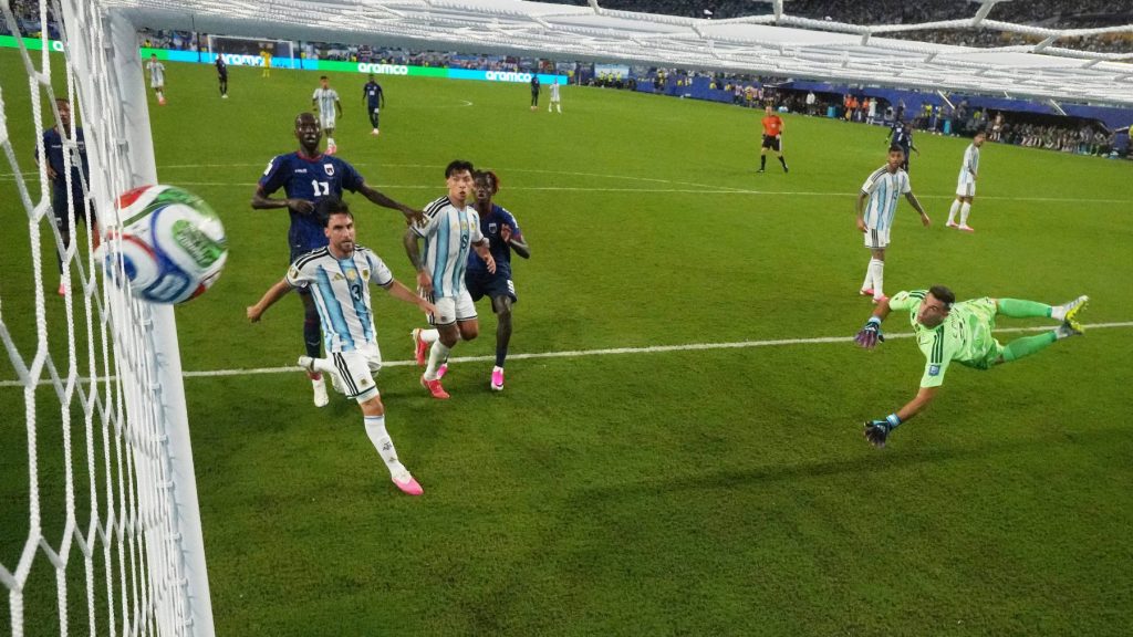 MIAMI GARDENS, FLORIDA - JULY 03: (EDITOR'S NOTE: Image was captured using a remote camera inside of the goal.) Emiliano Martinez #23 of Argentina concedes a second goal to Sidny Lopes Cabral #13 of Cabo Verde during the FIFA World Cup 2026 Round of 32 match between Argentina and Cabo Verde at Miami Stadium on July 03, 2026 in Miami Gardens, Florida. Robert Cianflone/Getty Images/AFP