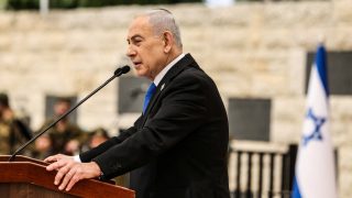 Israels Prime Minister Benjamin Netanyahu speaks during a ceremony commemorating Israels Remembrance Day for fallen soldiers, or Yom HaZikaron, at the Military Cemetery on Mount Herzl in Jerusalem on April 21, 2026. (Photo by Ilia YEFIMOVICH / POOL / AFP)
