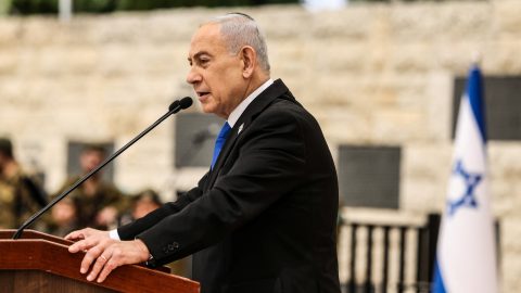 Israels Prime Minister Benjamin Netanyahu speaks during a ceremony commemorating Israels Remembrance Day for fallen soldiers, or Yom HaZikaron, at the Military Cemetery on Mount Herzl in Jerusalem on April 21, 2026. (Photo by Ilia YEFIMOVICH / POOL / AFP)