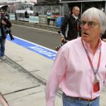 British President of the Formula One Organisation Administration Bernie Ecclestone walks in the pits of the Hungaroring racetrack, 04 August 2006 in Budapest, during the first practice session of the Hungarian Grand Prix. AFP PHOTO DAMIEN MEYER