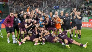 A Hearts játékosai ünneplik a Rapid Wiennel szembeni továbbjutást.
