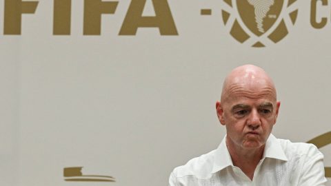 FIFA President Gianni Infantino gestures during his visit to the new Concentration Hotel of the Colombian Football Federation in Barranquilla, Colombia, on February 24, 2026. FIFA president Gianni Infantino came under renewed fire on August 10, 2026 as a joint letter from three confederations -- UEFA, CONCACAF and AFC -- declared football "belongs to no individual".