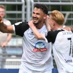 23 August 2026, Lower Saxony, Oldenburg: Soccer, Men: DFB Cup, SSV Jeddeloh II vs. 1. FC Heidenheim, First Round, Marschweg Stadium. Jeddeloh's Haris Hyseni (left) celebrates with Pascal Steinwender after scoring a penalty kick to make it 4-1. Photo: Carmen Jaspersen/dpa - IMPORTANT NOTICE: In accordance with the regulations of the Bundesliga and/or the DFB (German Football Association), it is prohibited to use or allow the use of photographs taken in the stadium and/or during the game in the form of sequential images and/or video-like photo sequences.