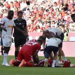 15.08.2026, Allianz Arena, Munich, Test match, FC FC Bayern Munich vs RB Leipzig , Jamal Musiala (Munich) collapses on the field, needs treatment, Ismael Saibari (Munich) holds his head. DFL regulations prohibit any use of photographs as image sequence