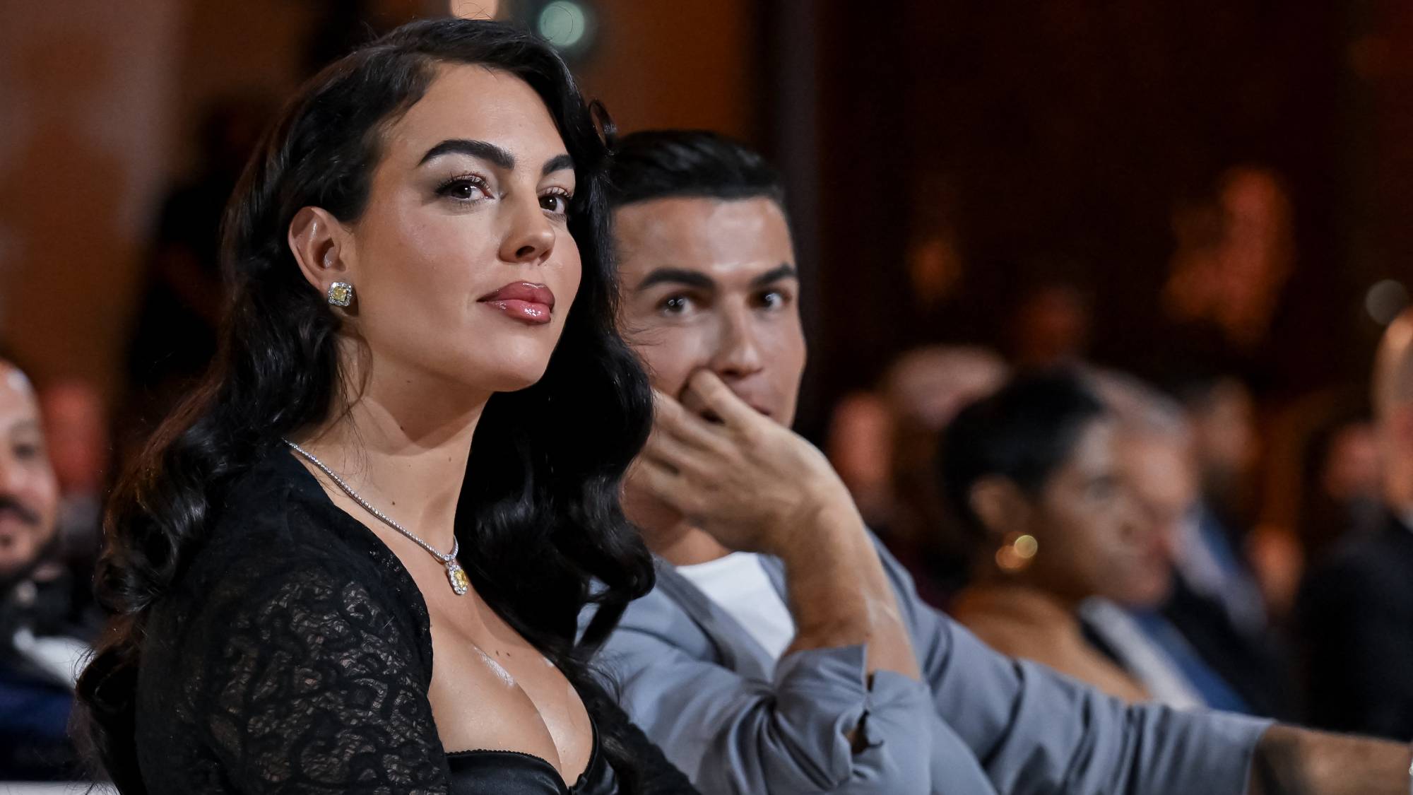 DUBAI, UNITED ARAB EMIRATES - DECEMBER 27: Al-Nassr player Cristiano Ronaldo (2nd L) and Georgina Rodriguez (L) attend the Globe Soccer Dubai Awards 2024 as part of the Dubai International Sports Conference 2024 in Dubai, United Arab Emirates (UAE) on December 27, 2024. Waleed Zein / Anadolu