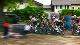 The pack rides during the 3rd (out of 9) stage of the fifth edition of the Women's Tour de France cycling race, 156.5 km from Geneva to Poligny, in Poligny, central-eastern France on August 3, 2026.