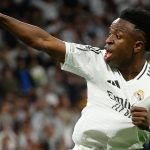 Real Madrid's Brazilian forward #07 Vinicius Junior celebrates scoring his team's first goal during the UEFA Champions League quarter final second leg football match between Real Madrid CF and Arsenal at Santiago Bernabeu Stadium in Madrid on April 16, 2025. Star forward Vinicius Junior has extended his contract with Real Madrid to 2032, the club announced on August 6, 2026, quelling speculation about his future that had linked him with Arsenal. "Real Madrid FC and Vinicius Jr have agreed the extension of the contract of our player, who is tied to the club until June 30, 2032," Los Blancos said in a statement.