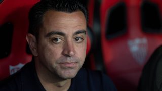 (FILES) Barcelona's Spanish coach Xavi Hernandez looks on prior to the Spanish league football match between Sevilla FC and FC Barcelona at the Ramon Sanchez Pizjuan stadium in Seville on May 26, 2024. Former Barcelona player and Spanish international Xavi Hernandez has been appointed manager of the Netherlands, succeeding Ronald Koeman, who resigned after the World Cup, the Dutch Football Association announced on August 12, 2026, via its social media channels.