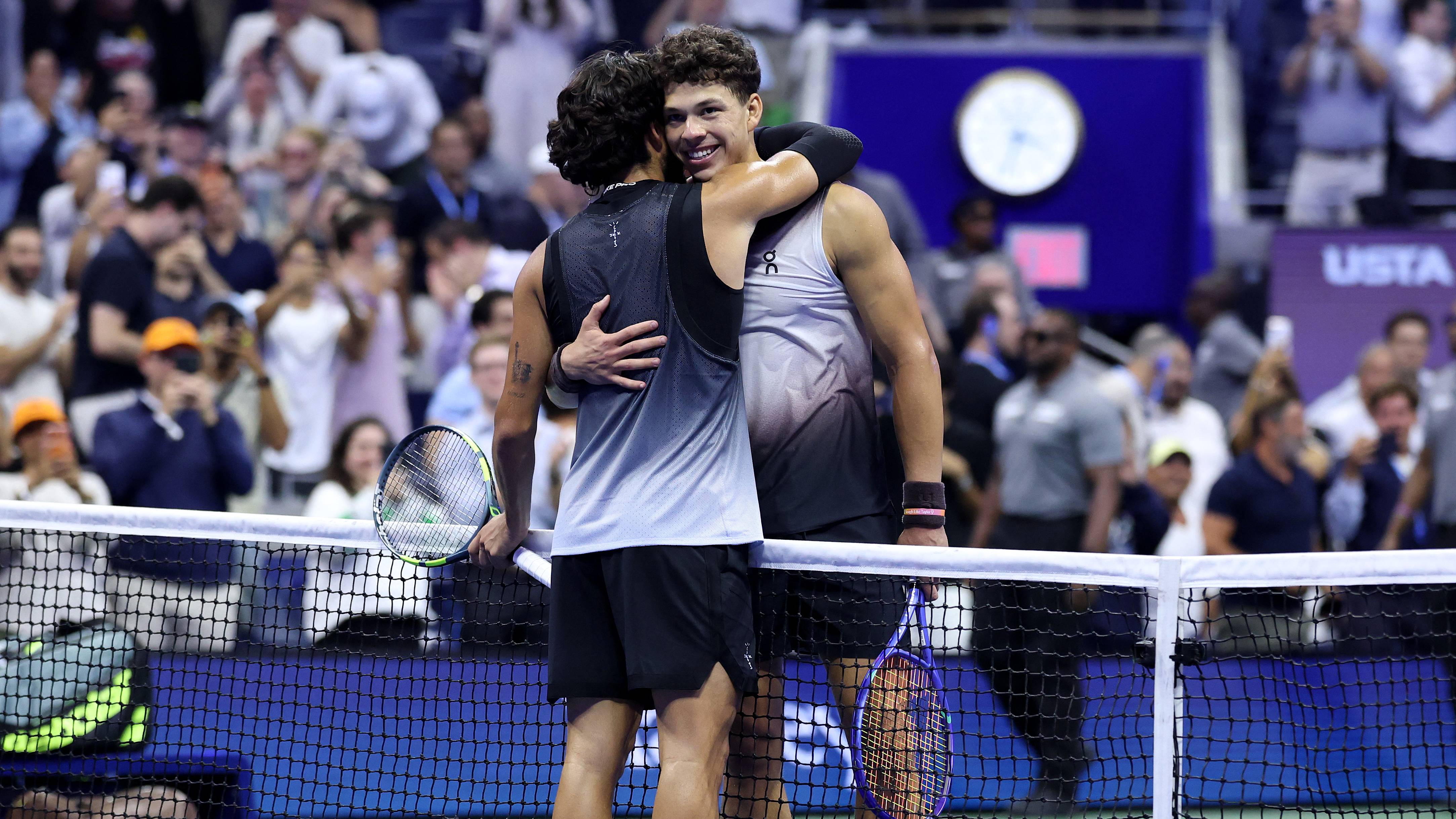NEW YORK, NEW YORK - SEPTEMBER 08: Ben Shelton of the United States embraces Carlos Alcaraz of Spain after Shelton won their Men's Singles Quarterfinal match on Day Ten of the 2026 US Open at USTA Billie Jean King National Tennis Center on September 08, 2026 in the Flushing neighborhood of the Queens borough of New York City. Julian Finney/Getty Images/AFP
