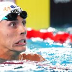 Romania's David Popovici reacts after winning the final of the men's 200m freestyle swimming event during the LEN European Aquatics Championships at the Olympic Aquatic Centre in Saint-Denis, northern suburbs of Paris, on August 14, 2026.