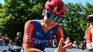 Ceratizit Pro Cycling's Afghan rider Fariba Hashimi flashes the V-sign after winning the women’s Elite race of the Afghan National Road Cycling championships organised in Les Herbiers, western France, on June 28, 2025.