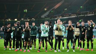 Ferencvaros' Norwegian midfielder #16 Kristoffer Zachariassen (R) and teammates applaud the fans following the UEFA Europa League, League phase football match between Celtic and Ferencvaros at Celtic Park in Glasgow on September 17, 2026.