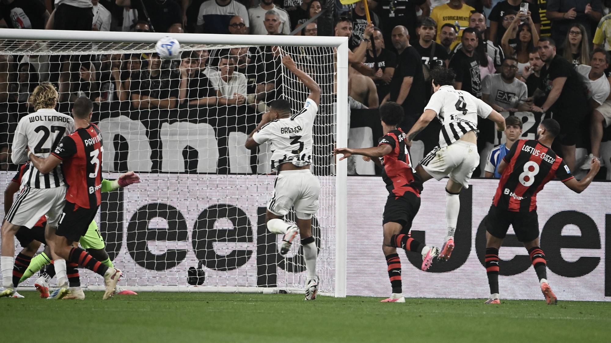 Juventus' Italian defender #04 Federico Gatti scores his team's first goal during the Italian Serie A football match between Juventus and AC Milan at the Allianz Stadium in Turin on September 6, 2026.