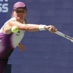 Poland's Iga Swiatek hits a return against China's Qinwen Zheng during their women's singles round of 16 tennis match on day nine of the US Open tennis tournament at the USTA Billie Jean King National Tennis Center in New York on September 7, 2026.