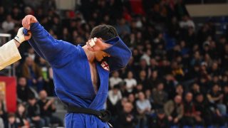 TBILISI, GEORGIA - MARCH 22: Luka Javakhishvili of Georgia (white) reacts after defeating Akaki Japaridze of Georgia (blue) in the Men's -90kg bronze medal contest during Tbilisi Grand Slam 2026 at New Sports Palace on March 22, 2026 in Tbilisi, Georgia. (Photo by Levan Verdzeuli/Getty Images)