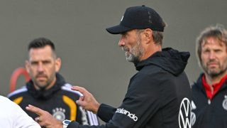 dpatop - 22 September 2026, Bavaria, Herzogenaurach: Soccer: National team, training ahead of the first Nations League match against the Netherlands. National team coach Jürgen Klopp (Germany) gives tactical instructions. Photo: Federico Gambarini/dpa