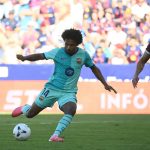 Barcelona's German forward #14 Karim Adeyemi scores his team's fourth goal during the Spanish league football match between Levante UD and FC Barcelona at Ciutat de Valencia Stadium in Valencia on September 13, 2026.
