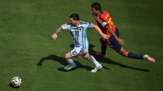 Argentina's forward #10 Lionel Messi (L) and Spain's midfielder #16 Rodri fight for the ball during the 2026 World Cup football tournament final match between Spain and Argentina at the New York/New Jersey Stadium in East Rutherford on July 19, 2026.