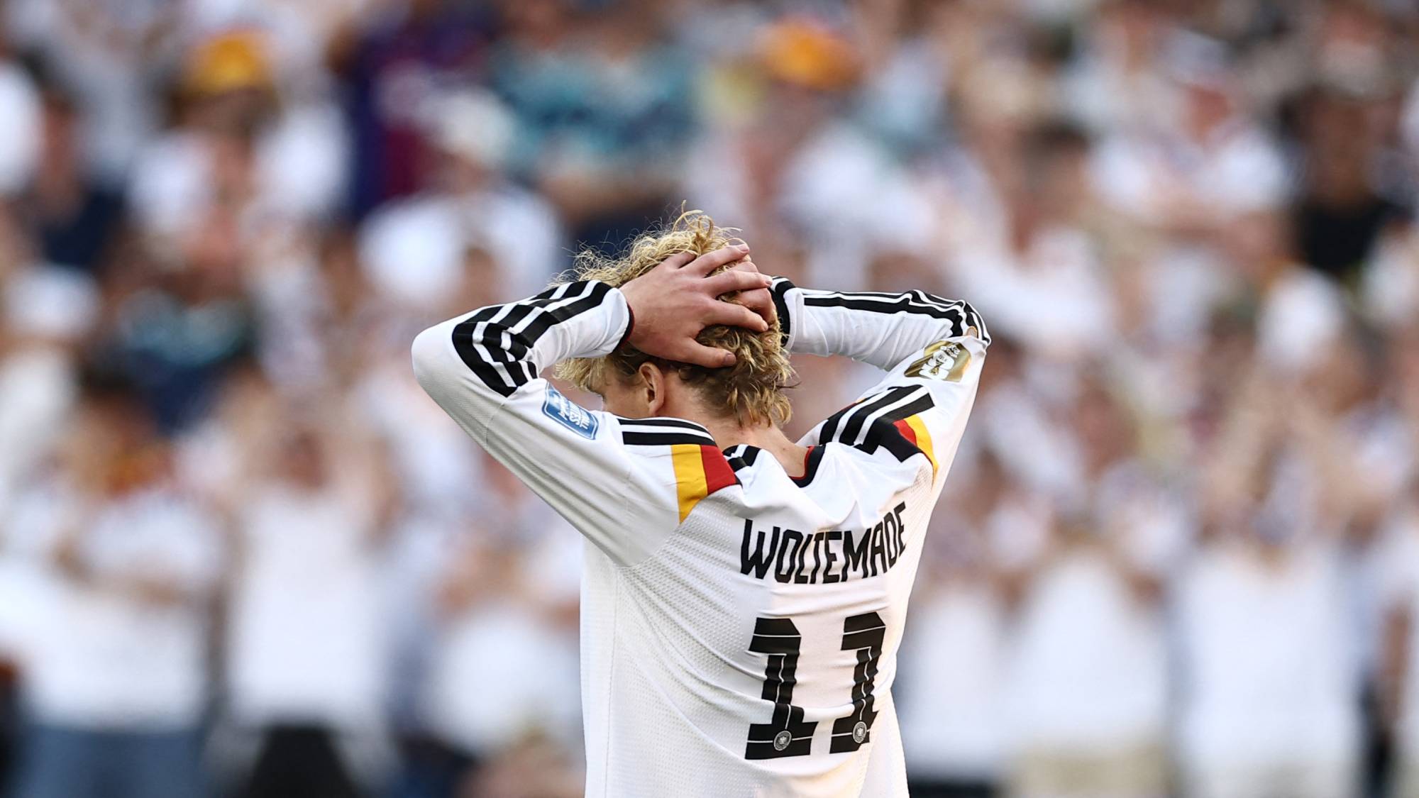Germany's forward #11 Nick Woltemade reacts after missing a penalty kick during the penalty shootout of the 2026 World Cup round of 32 football match between Germany and Paraguay at the Boston Stadium in Foxborough on June 29, 2026.