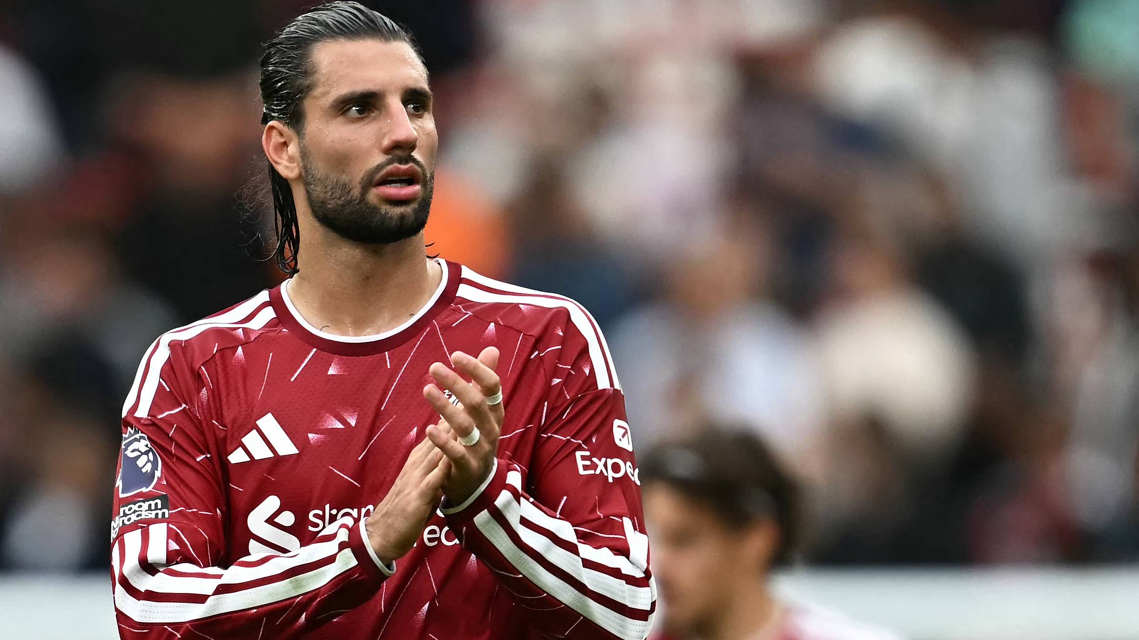 Liverpool's Hungarian midfielder #08 Dominik Szoboszlai claps the fans after the English Premier League football match between Liverpool and Fulham at Anfield in Liverpool, north west England on September 12, 2026.