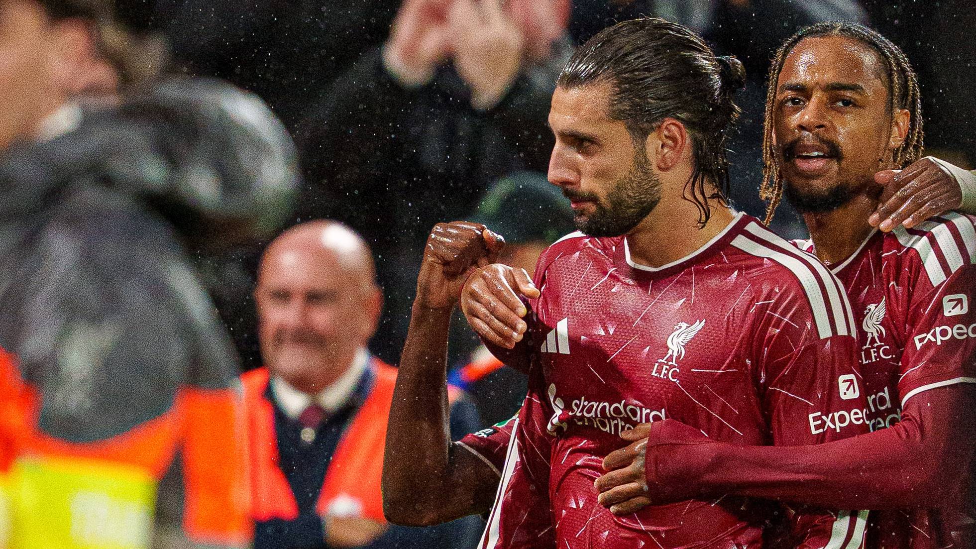 Dominik Szoboszlai of Liverpool celebrates with Bradley Barcola after scoring their third goal during the Carabao Cup Third Round match between Liverpool and Tottenham Hotspur at Anfield in Liverpool, on September 15, 2026. (Photo by Steven Halliwell/MI News/NurPhoto)