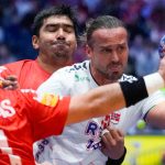 Norway's right back #15 Kent Robin Tonnesen (R) attempts to get past Chile's Esteban Salinas during the Main Round group II match of the IHF Men's Handball World Championship Chile vs Norway in Fornebu, west of Oslo, Norway on January 24, 2025.