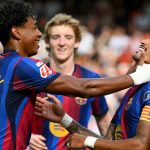 Barcelona's Brazilian forward #11 Raphinha (R) celebrates with Barcelona's Spanish forward #10 Lamine Yamal scoring his team's third goal during the Spanish league football match between Valencia CF and FC Barcelona at Mestalla Stadium in Valencia on September 6, 2026.