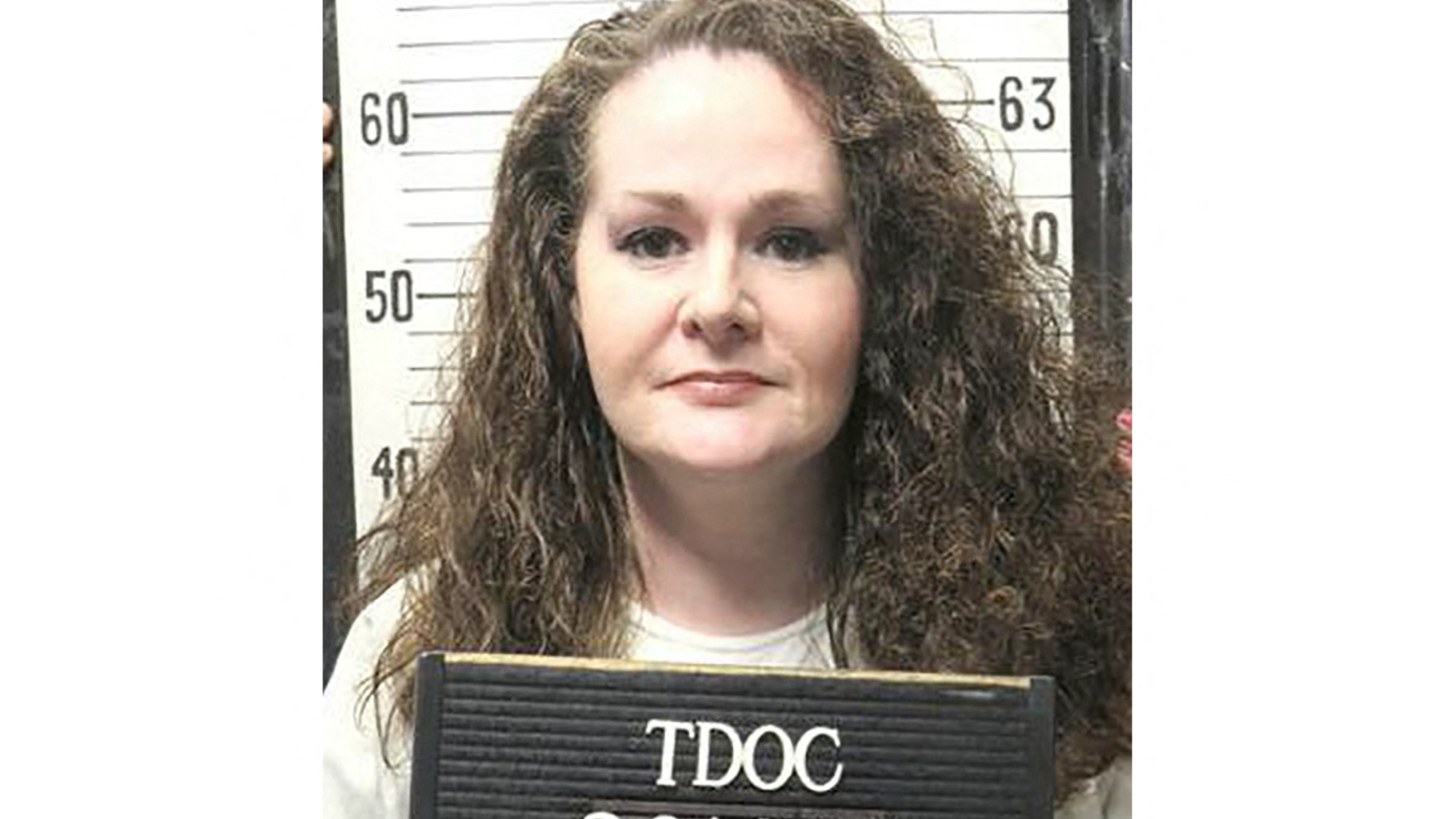 This handout picture dated January 12, 2023 provided by the Tennessee Department of Correction shows convicted US murderer Christa Pike. A Tennessee woman convicted of murder survived two lethal injection doses and was hospitalized in the early hours of Ocotber 1, 2026, her lawyers said, marking the state's second failed execution in months and prompting it to halt capital punishment this year. Hours earlier on September 30, the Supreme Court cleared the way for Christa Pike, 50, to become the first woman to be executed in the southern US state of Tennessee in 200 years -- but the attempt failed. (Photo by Handout / Tennessee Department of Correction / AFP) / RESTRICTED TO EDITORIAL USE - MANDATORY CREDIT "AFP PHOTO / Tennessee Department of Correction" - NO MARKETING NO ADVERTISING CAMPAIGNS - DISTRIBUTED AS A SERVICE TO CLIENTS
