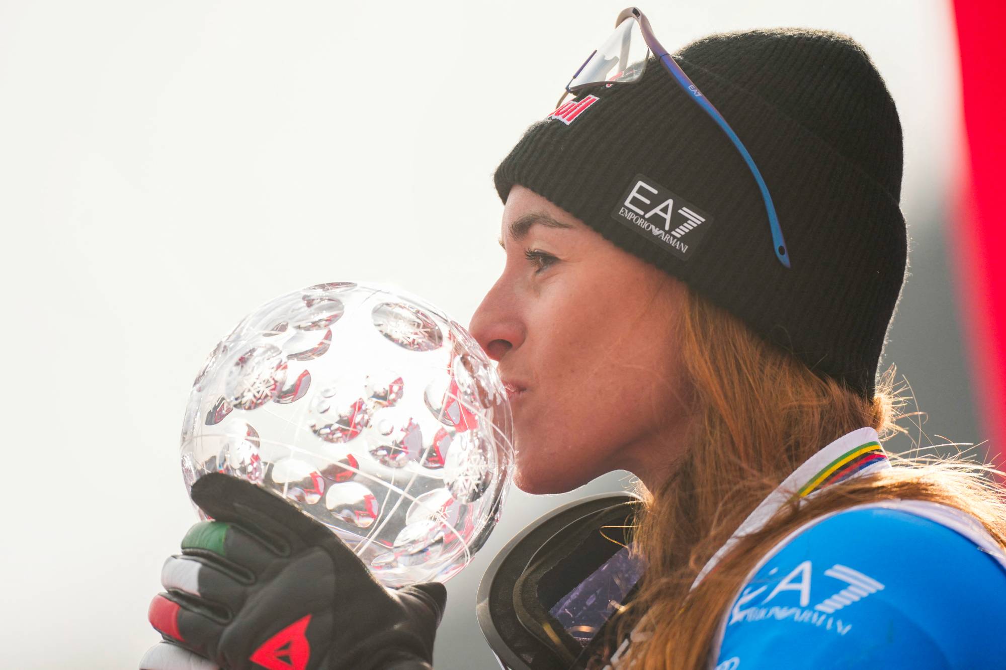 Overall winner Italy's Sofia Goggia kisses the Super-G overall trophy after the women's FIS Ski World Cup super-G event in Kvitfjell, near Lillehammer, Norway on March 22, 2026.