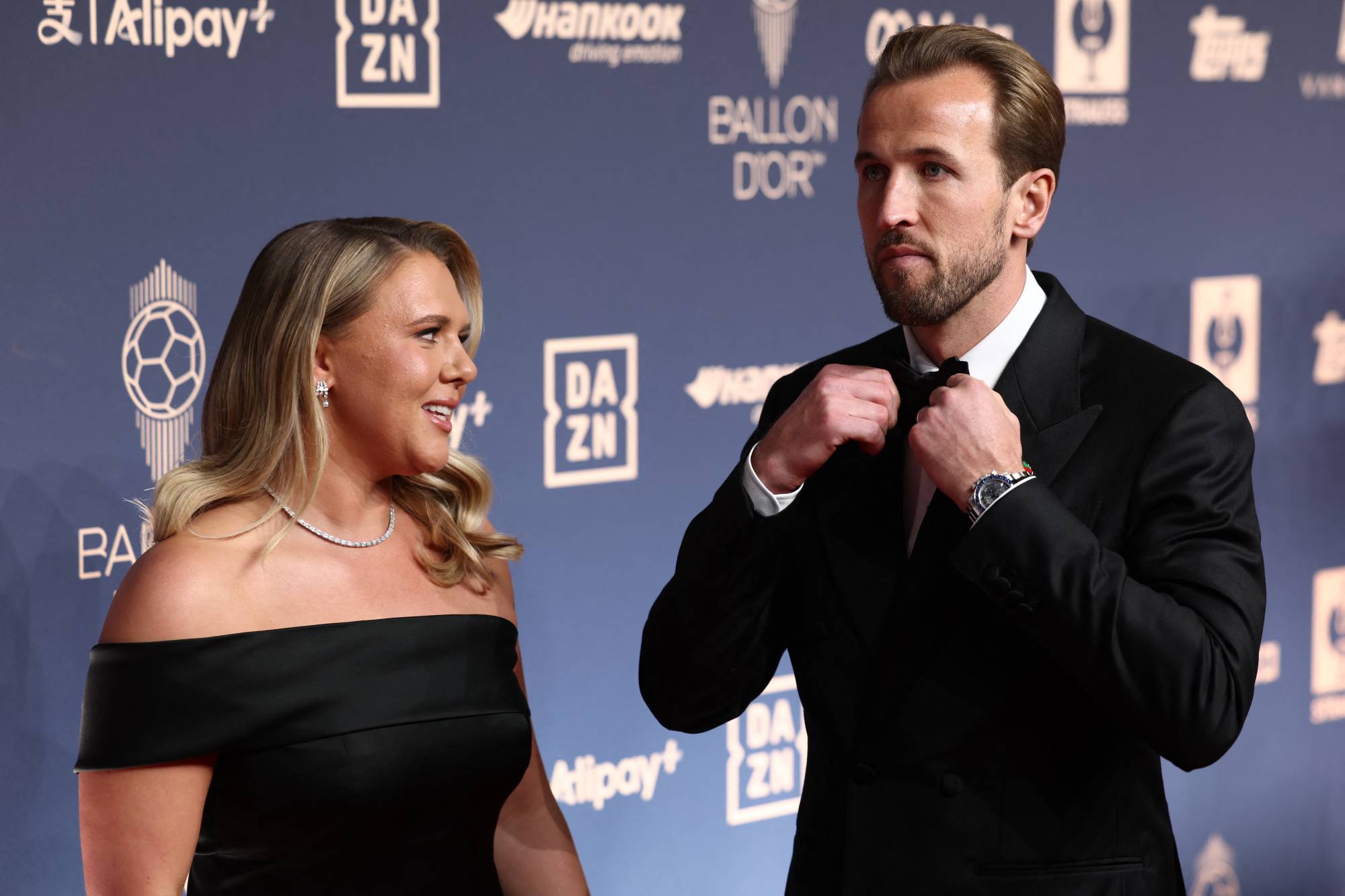 England and Bayern Munich forward Harry Kane and his wife Katie Goodland arrive to attend the 2026 Ballon d'Or France Football award ceremony at the Palladium Theatre in London on October 26, 2026.