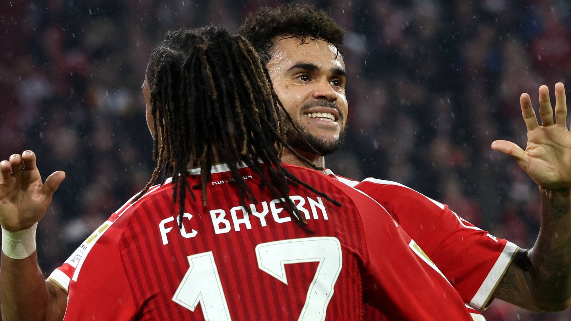 dpatop - 17 October 2026, Bavaria, Munich: Soccer, Men: Bundesliga, FC Bayern Munich vs. RB Leipzig, Matchday 6, Allianz Arena; Michael Olise (front, Bayern Munich) celebrates his goal to make it 3-0 with Luis Díaz (Bayern Munich). Photo: Karl-Josef Hildenbrand/dpa - IMPORTANT NOTICE: In accordance with the regulations of the Bundesliga and the DFB (German Football Association), it is prohibited to use or allow the use of photographs taken in the stadium and/or during the game in the form of sequential images and/or video-like photo series.