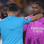 BOURNEMOUTH, ENGLAND - OCTOBER 22: Mike Maignan of AC Milan protests after Referee, Vasilis Fotias shows him a Red during the UEFA Europa League 2026/27 League Phase MD3 match between AFC Bournemouth and AC Milan at Bournemouth Stadium on October 22, 2026 in Bournemouth, England. (Photo by Catherine Ivill - AMA/Getty Images)