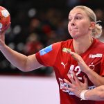 Denmark's left back #42 Michala Elsberg Moller (L) passes the ball in front of Croatia's left back #04 Tina Barisic during the women's EHF 2024 European championship handball game between Denmark and Croatia at the St Jakobshalle in Basel on November 29, 2024.