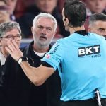 Referee Juan Martinez Munuera (R) speaks to Real Madrid's Portuguese coach Jose Mourinho during the Spanish league football match between FC Barcelona and Real Madrid CF at Camp Nou Stadium in Barcelona on October 25, 2026.
