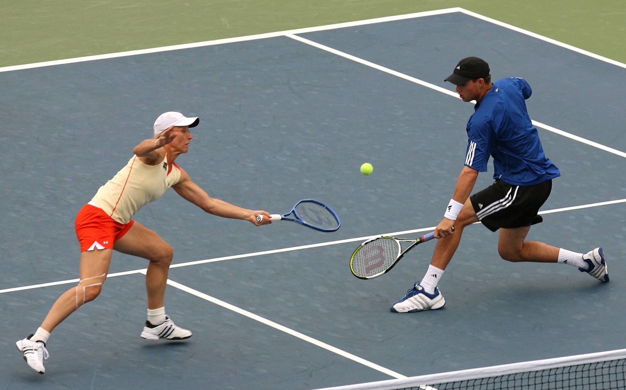 NEW YORK - SEPTEMBER 01: Martina Navratilova and Bob Bryan return a shot to Corina Morariu and Mike Bryan during the U.S. Open at the USTA Billie Jean King National Tennis Center in Flushing Meadows Corona Park on September 1, 2006 in the Flushing neighborhood of the Queens borough of New York City. (Photo by Nick Laham/Getty Images) *** Local Caption *** Martina Navratilova;Bob Bryan