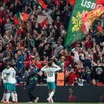 Portugal's defender #20 Joao Cancelo (R) celebrates scoring the opening goal with his teammates during the UEFA Nations League Group A4 match between Denmark and Portugal at Parken stadium in Copenhagen on October 1, 2026.